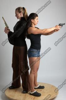 2021 01 OXANA AND XENIA STANDING POSE WITH GUNS (7)